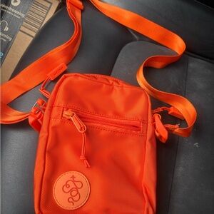 Baboon to the Moon orange crossbody.